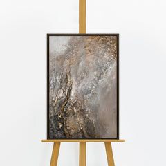 Handgemaltes Acrylbild „Universum I" auf Staffelei – Gold und Grau Reliefstruktur, dunkler Rahmen