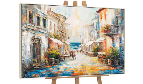 Mediterrane Stadtansicht – Leinwandbild mit beigem Rahmen